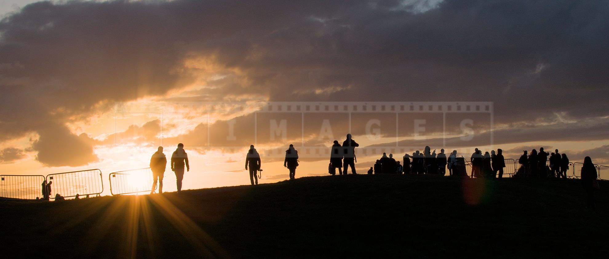Amazing sunset at Calton Hill and people watching it