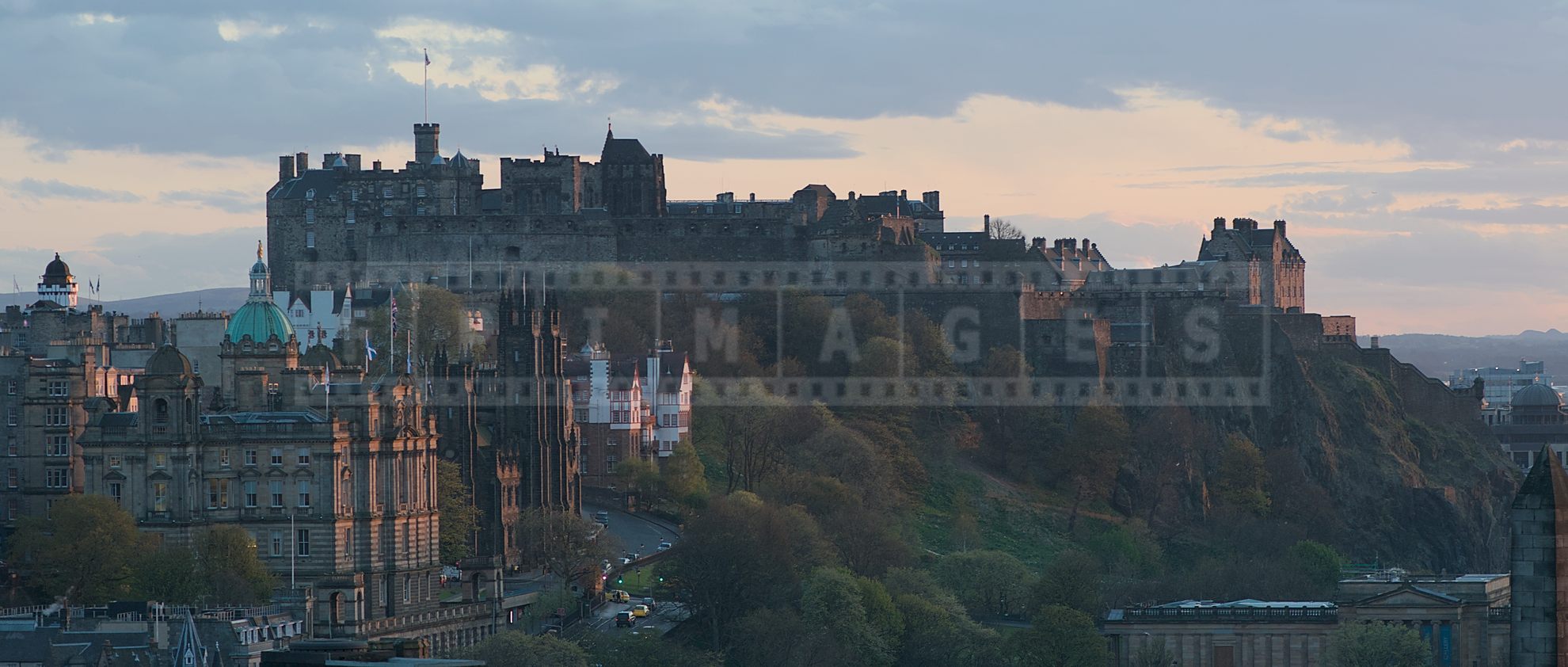 a view of Edinburgh Castle scenic landscape at sunset from the Calton Hill