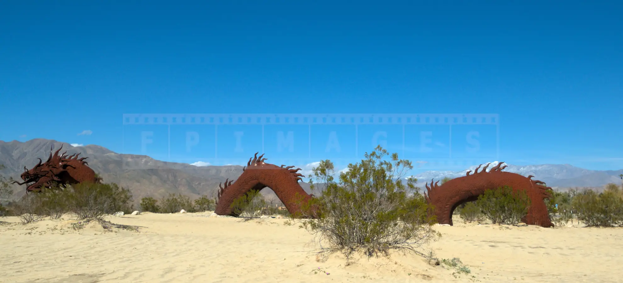 Sea Dragon metal sculpture rising from the desert sand Borrego Springs area, California